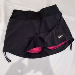 NIKE skirt with pink spandex shorts underneath
